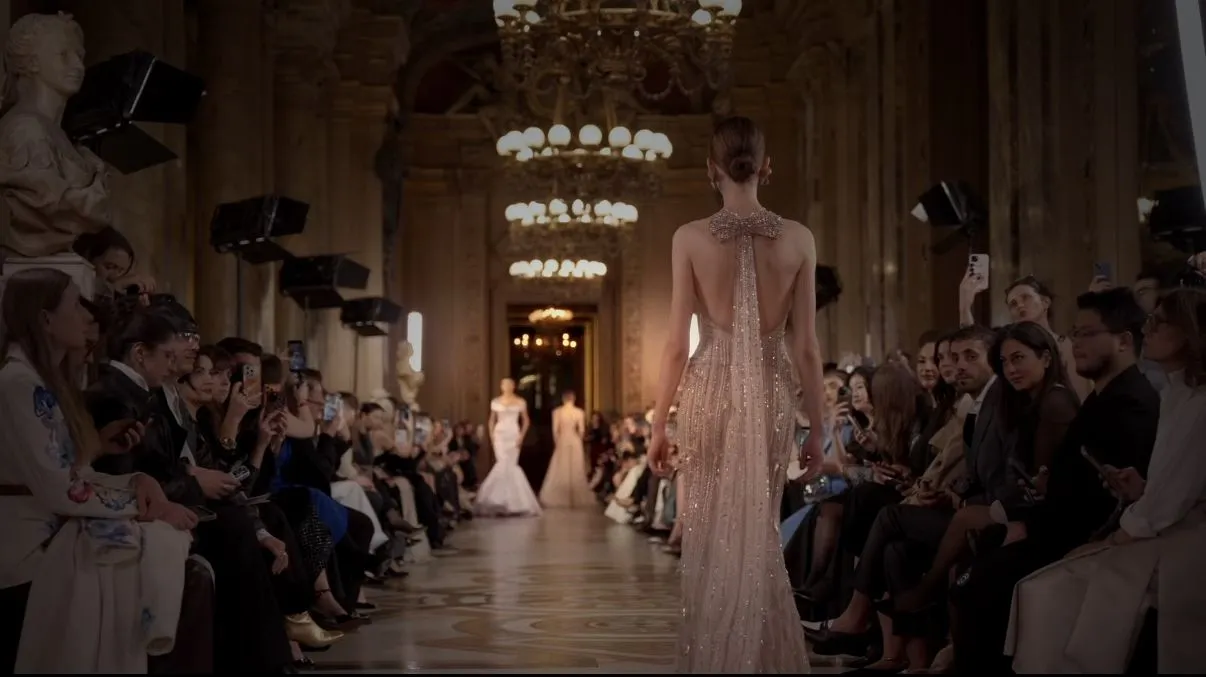 Fashion runway event in a grand hall for strategic private access experiences